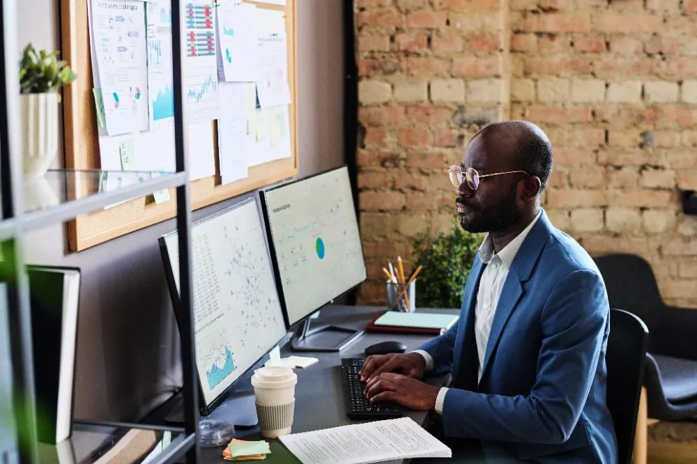 analyst working on a computer