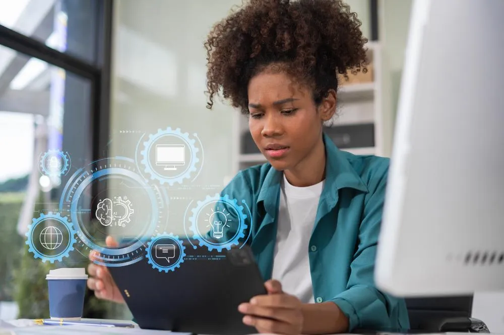 a girl holding a tablet wtih floating icons